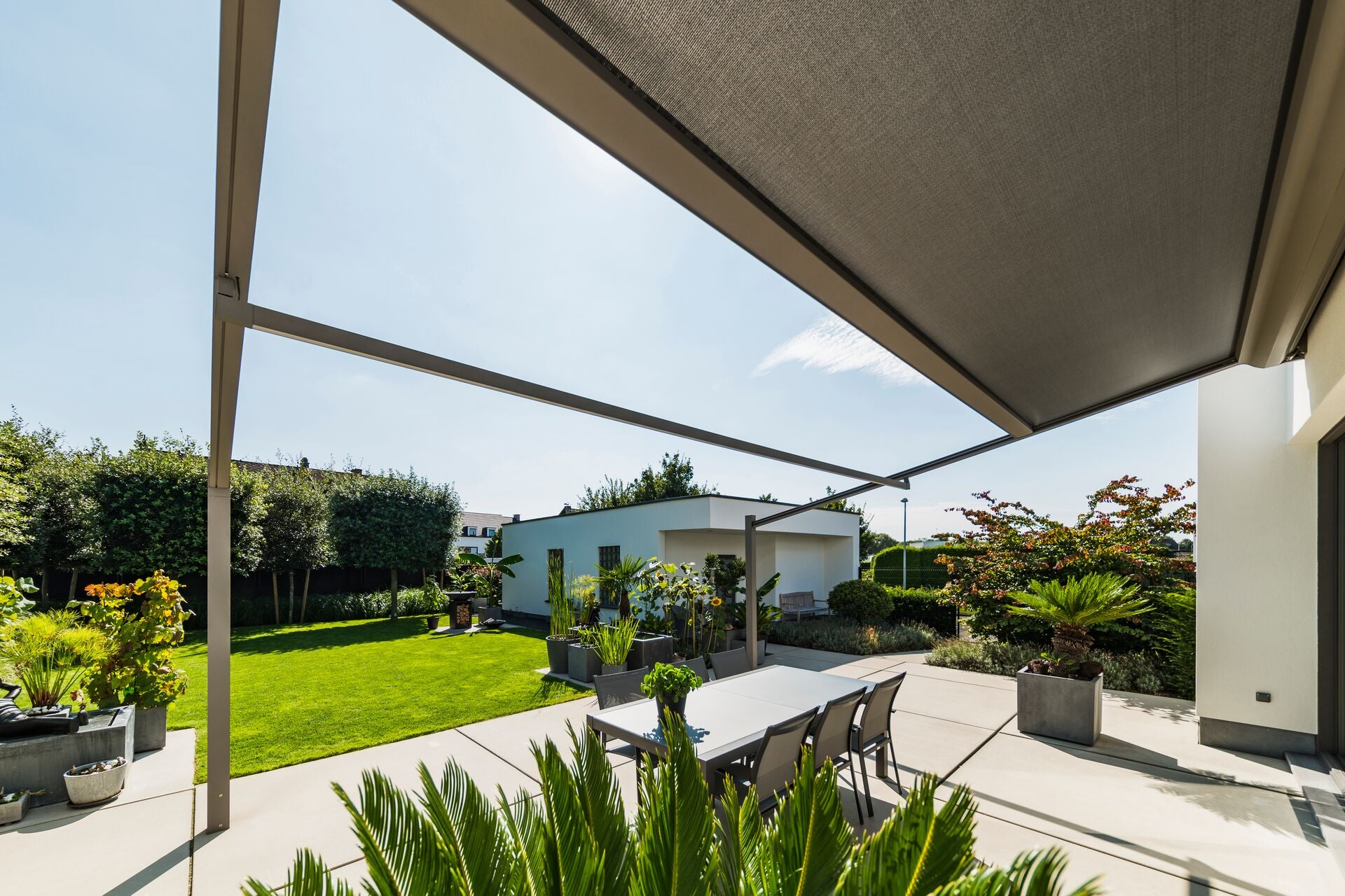 Renson Lapure retractable fabric roof pergola on a private residence
