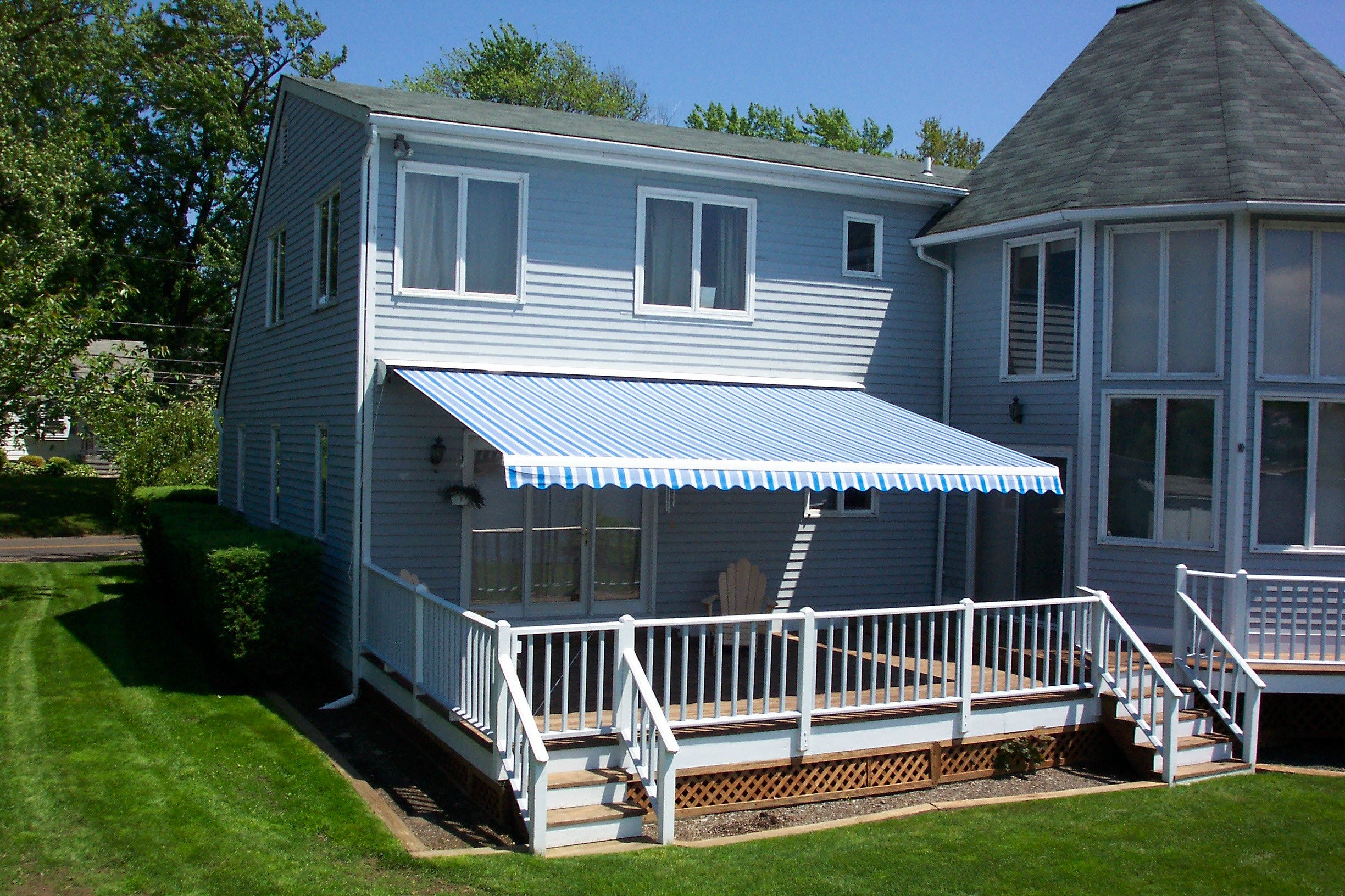 Helios retractable awning in a backyard