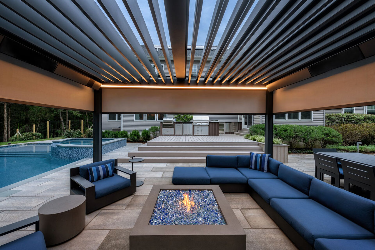 Renson Camargue louvered pergola over a luxury poolside lounge